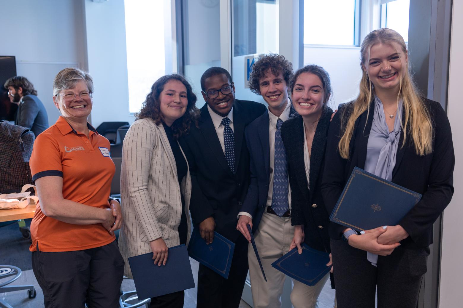 Team M.A.S.T. (Microplastic Aquatic Separation Tanks), pictured here with instructor Cindy Athanasiou, won first place at the Spring 2023 Cornerstone Competition.