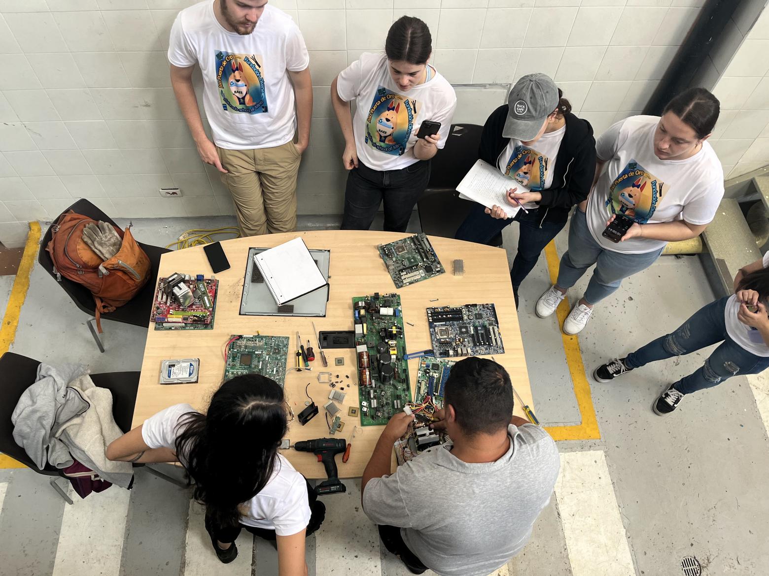 Humanitarian Engineering students learn about e-waste recycling in community-led design projects with Puerta de Oro, an association of recyclers in Bogotá, Colombia.