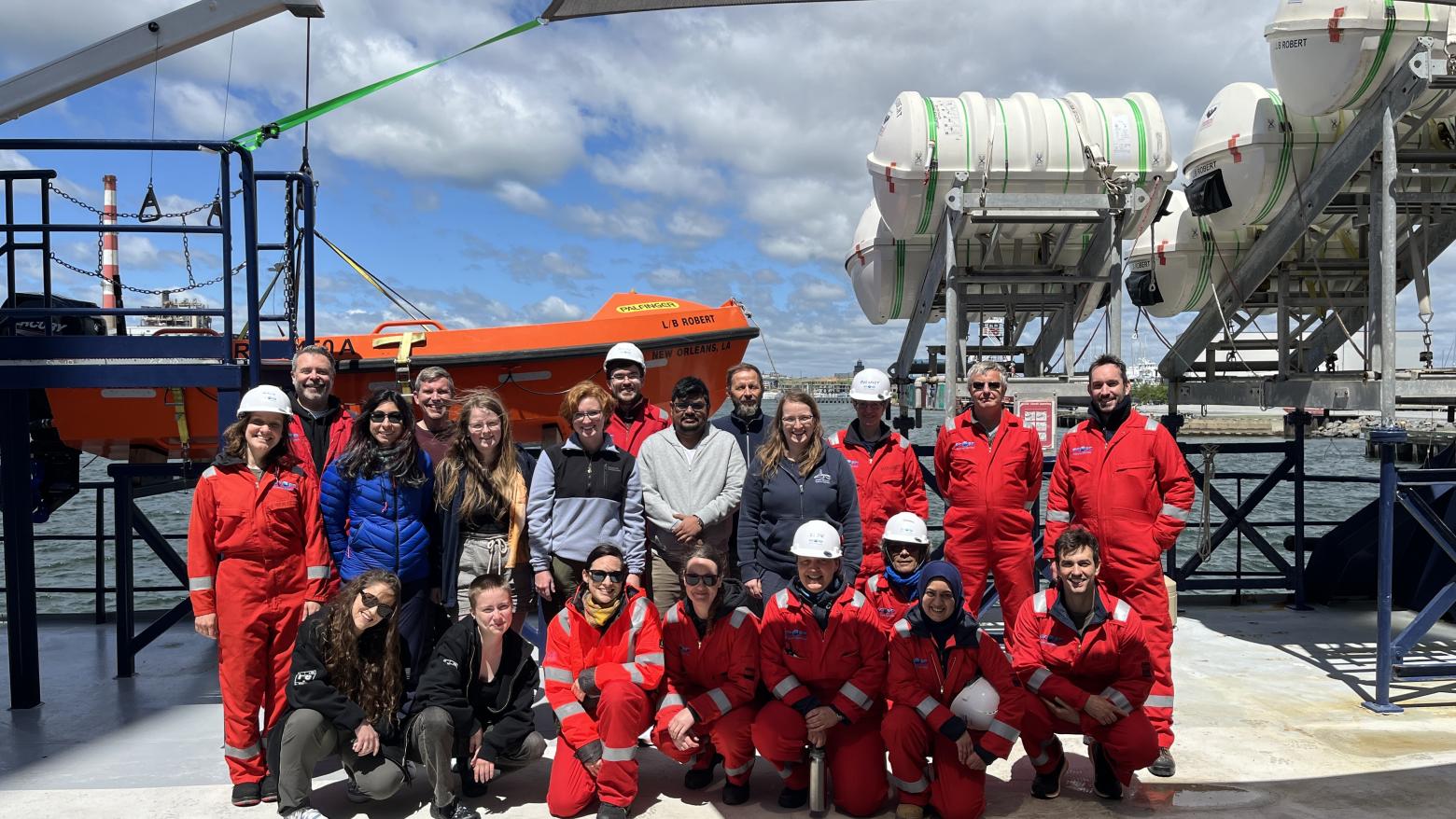 Group picture of scientists aboard the Liftboat Robert