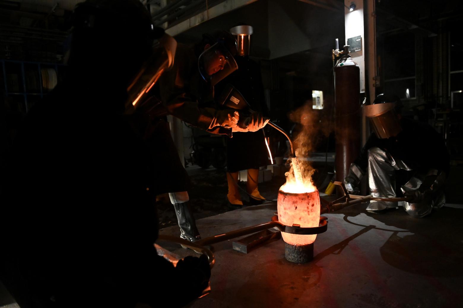 Hot Shop manager Sarah Harling works on one of more than 50 individual pieces