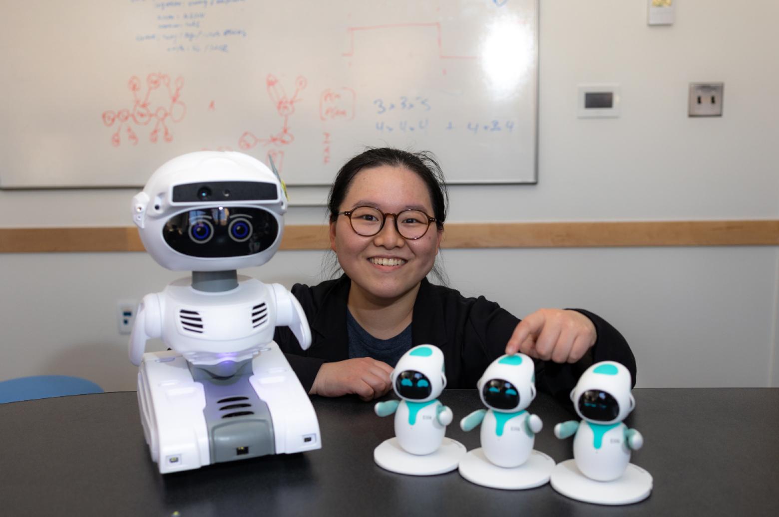 Ruchen Wen working with robots
