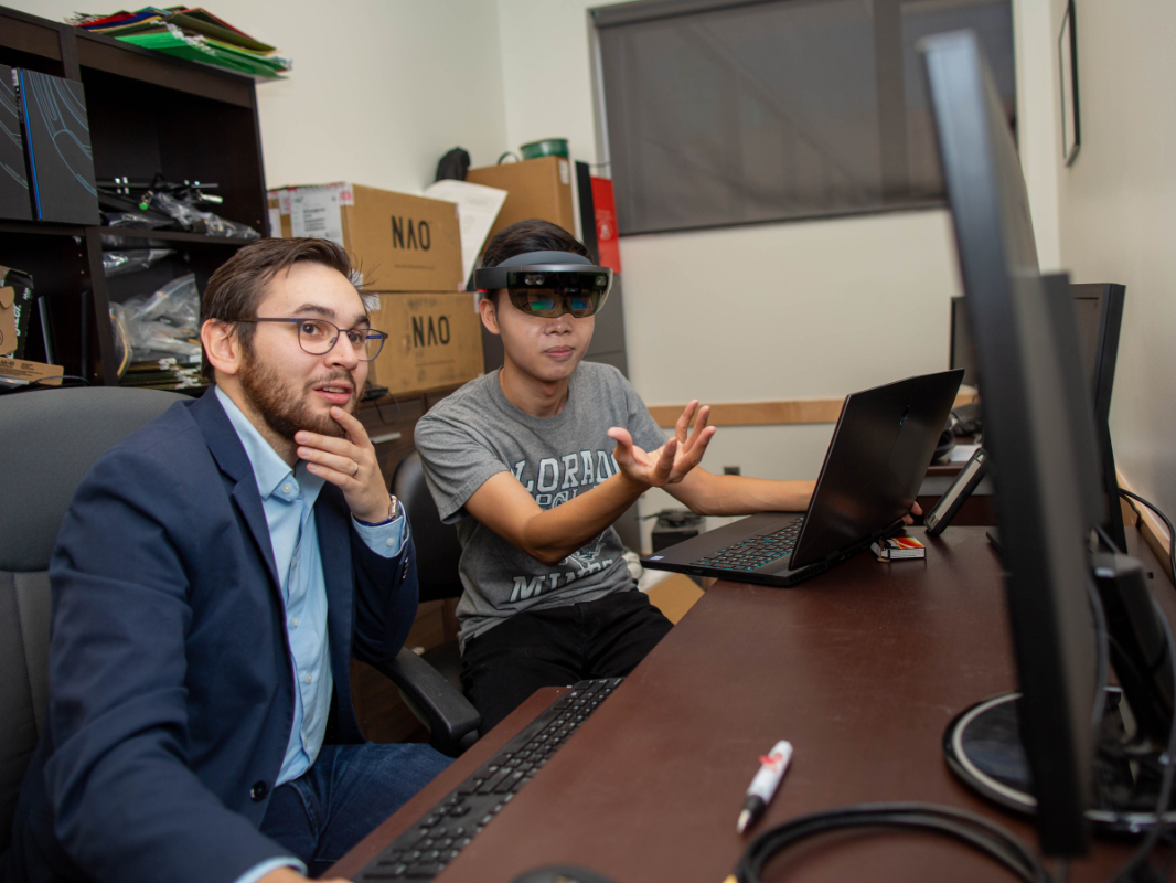 Tom Williams with student in Mirror Lab