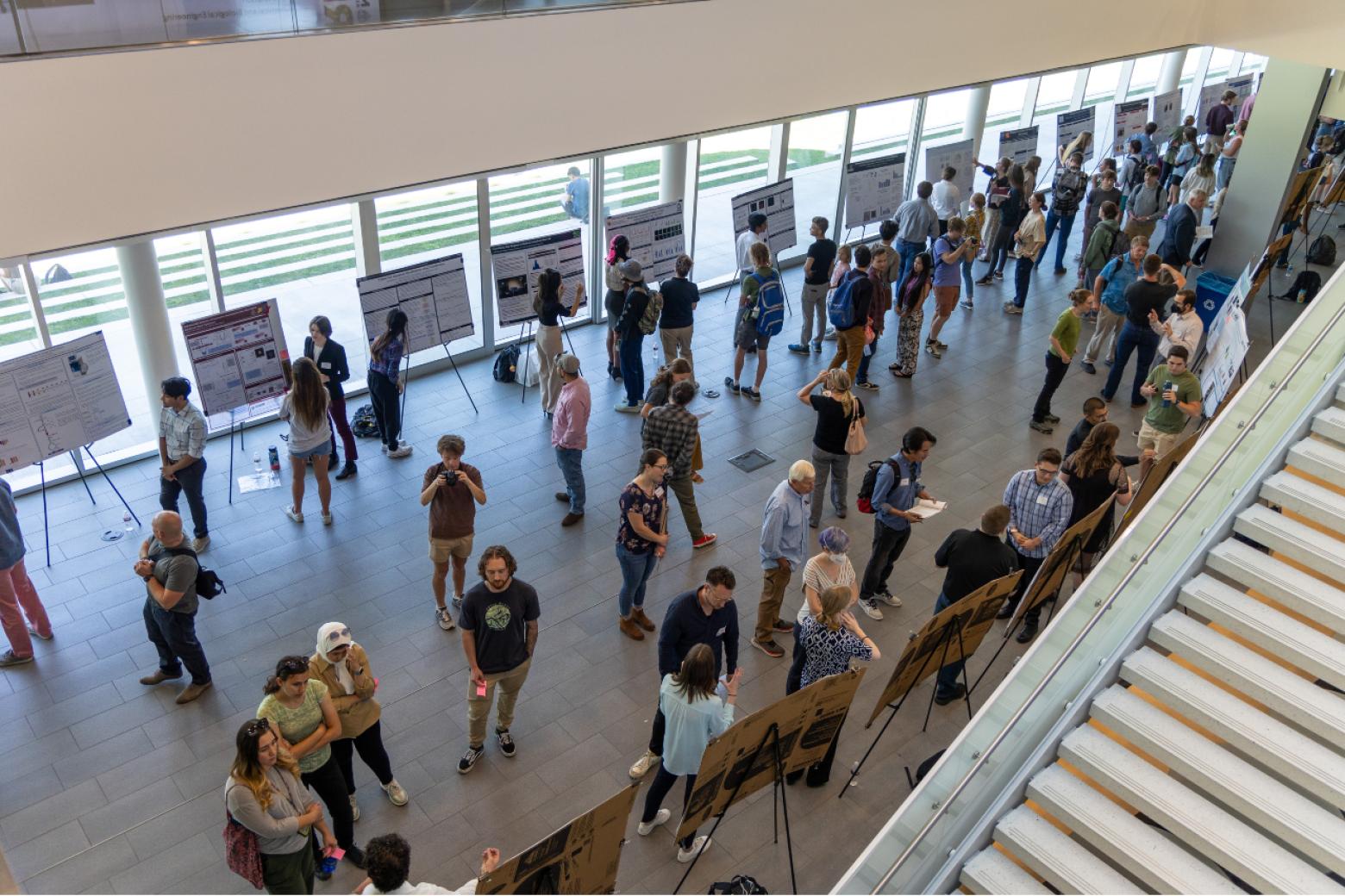 Aerial photo of dozens of students and faculty attending the 2023 Undergrad Research Symposium.