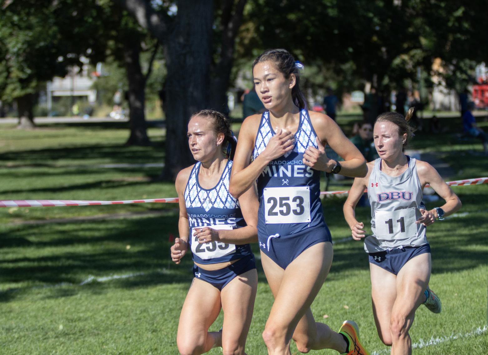 Zoe Baker runs during a cross country meet