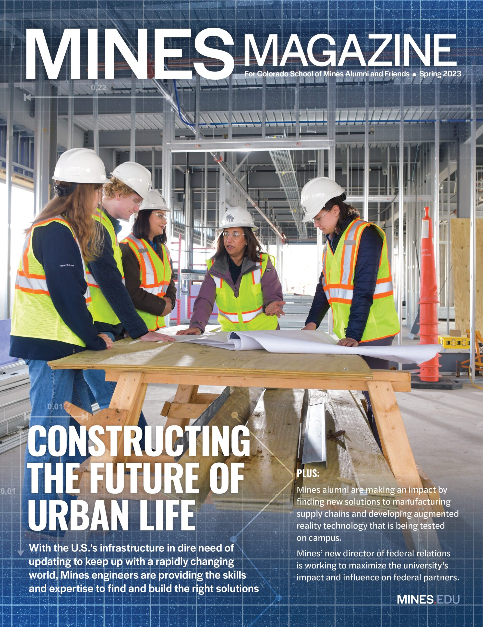 Cover of Mines Magazine Spring 2023 showing engineers in safety gear discussing blueprints at a construction site.