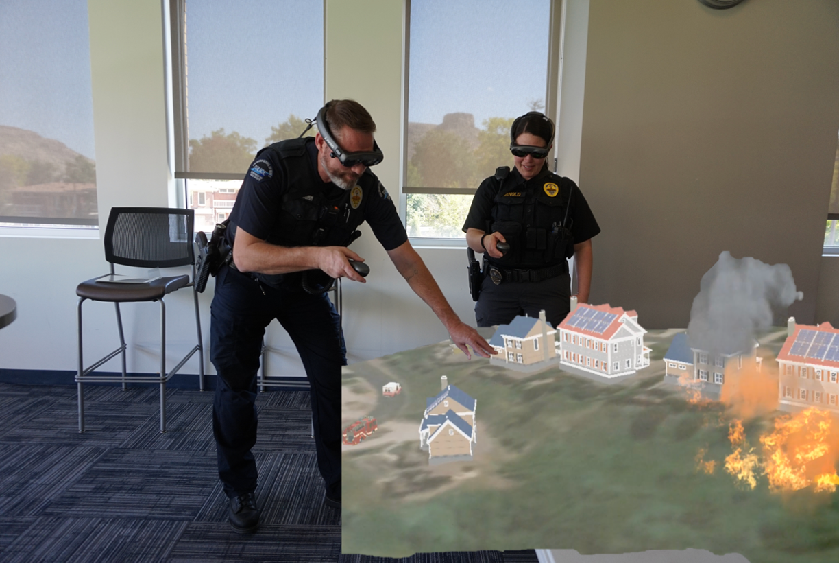 Two Mines Police officers conduct training with AR glasses