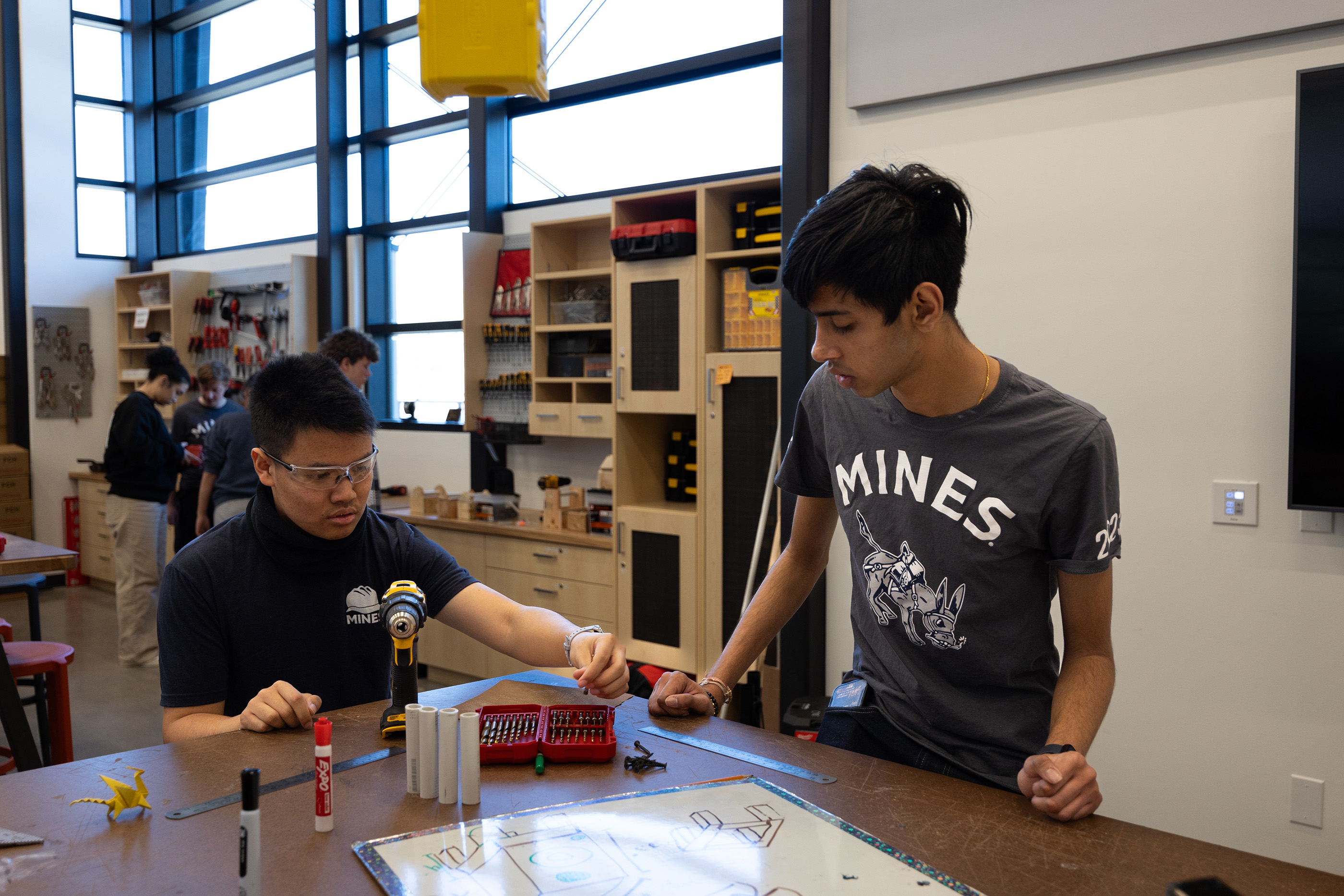 Fynn Promboon and Dev Patel working on an engineering project