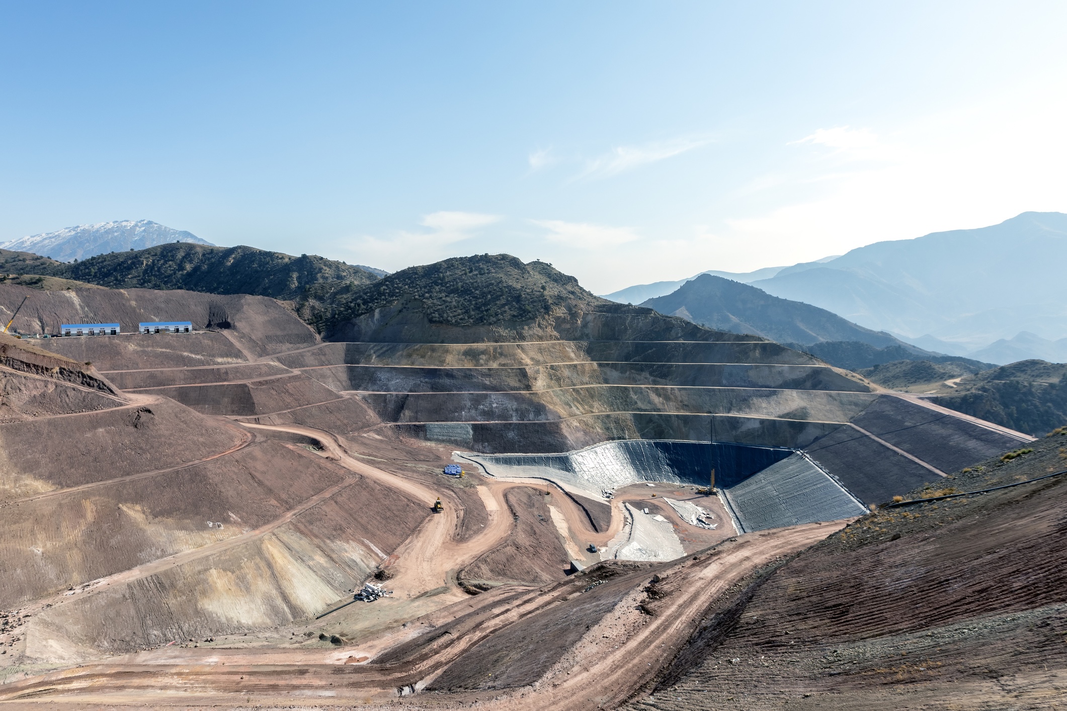 An aerial view of an industrial mine waste dam.