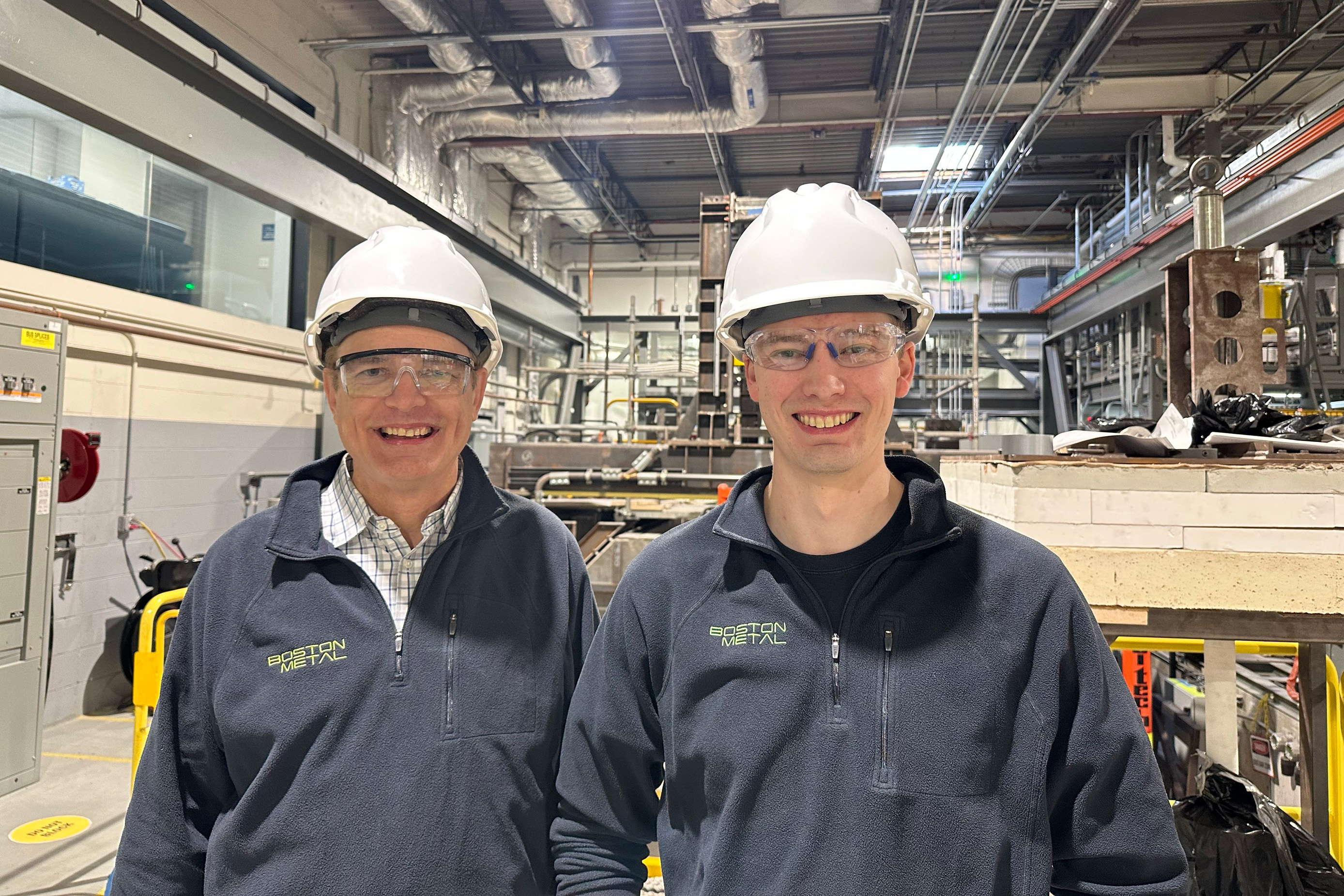 Steve Sparkowich and Daniel Wright in hard hats at Boston Metal