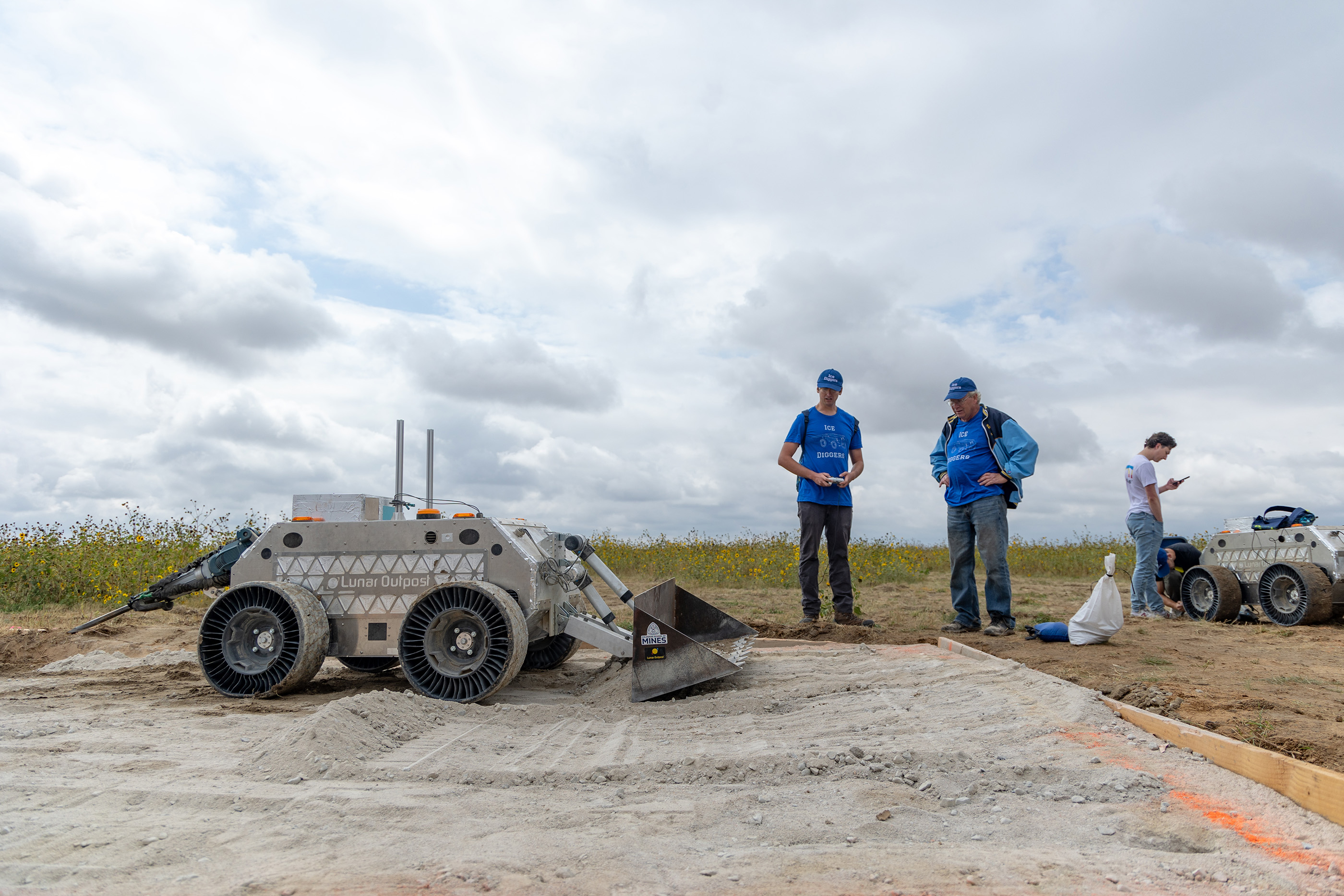 A Mines student operates a lunar rover system at at testing site