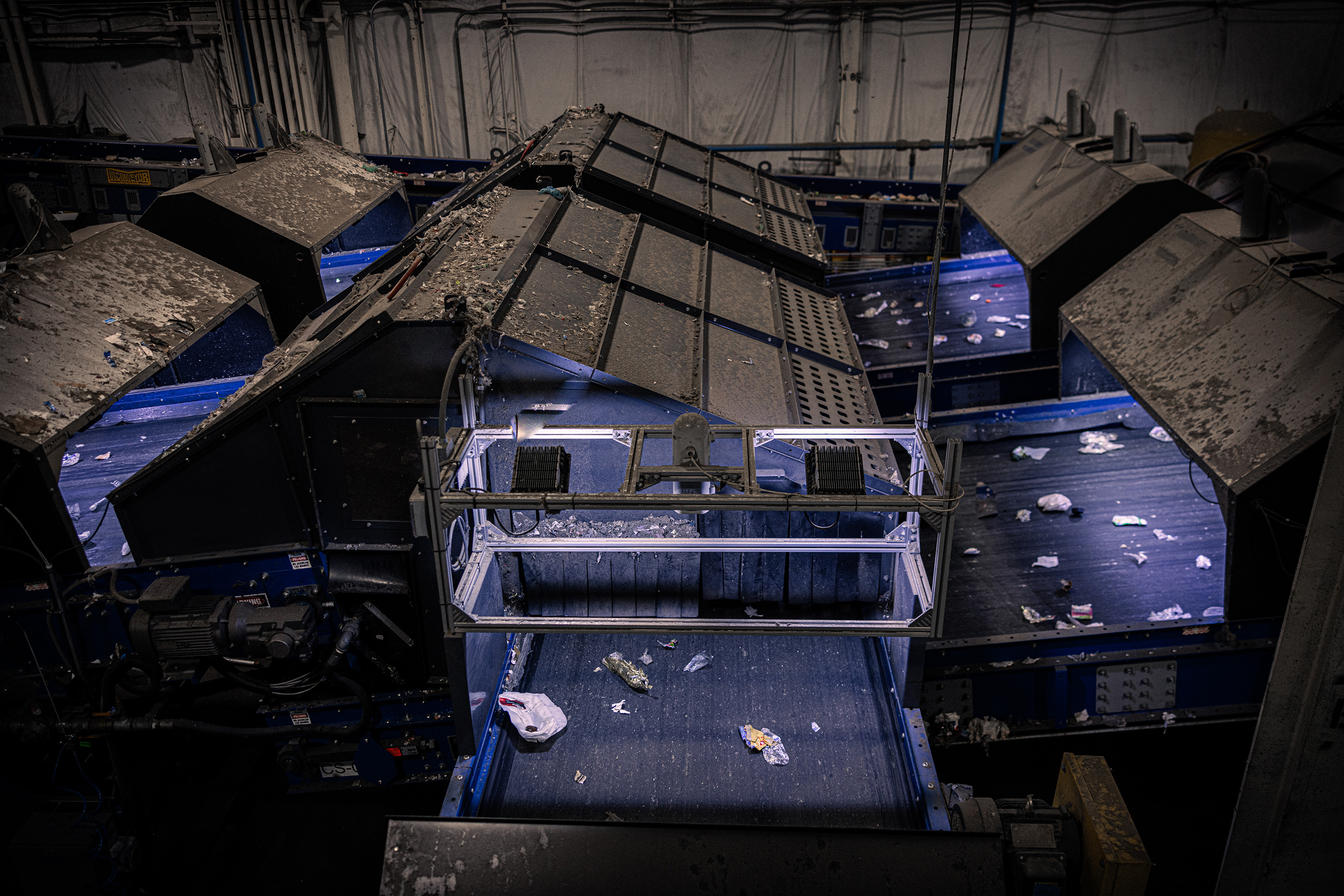 An overhead view of a recycling sorting machine