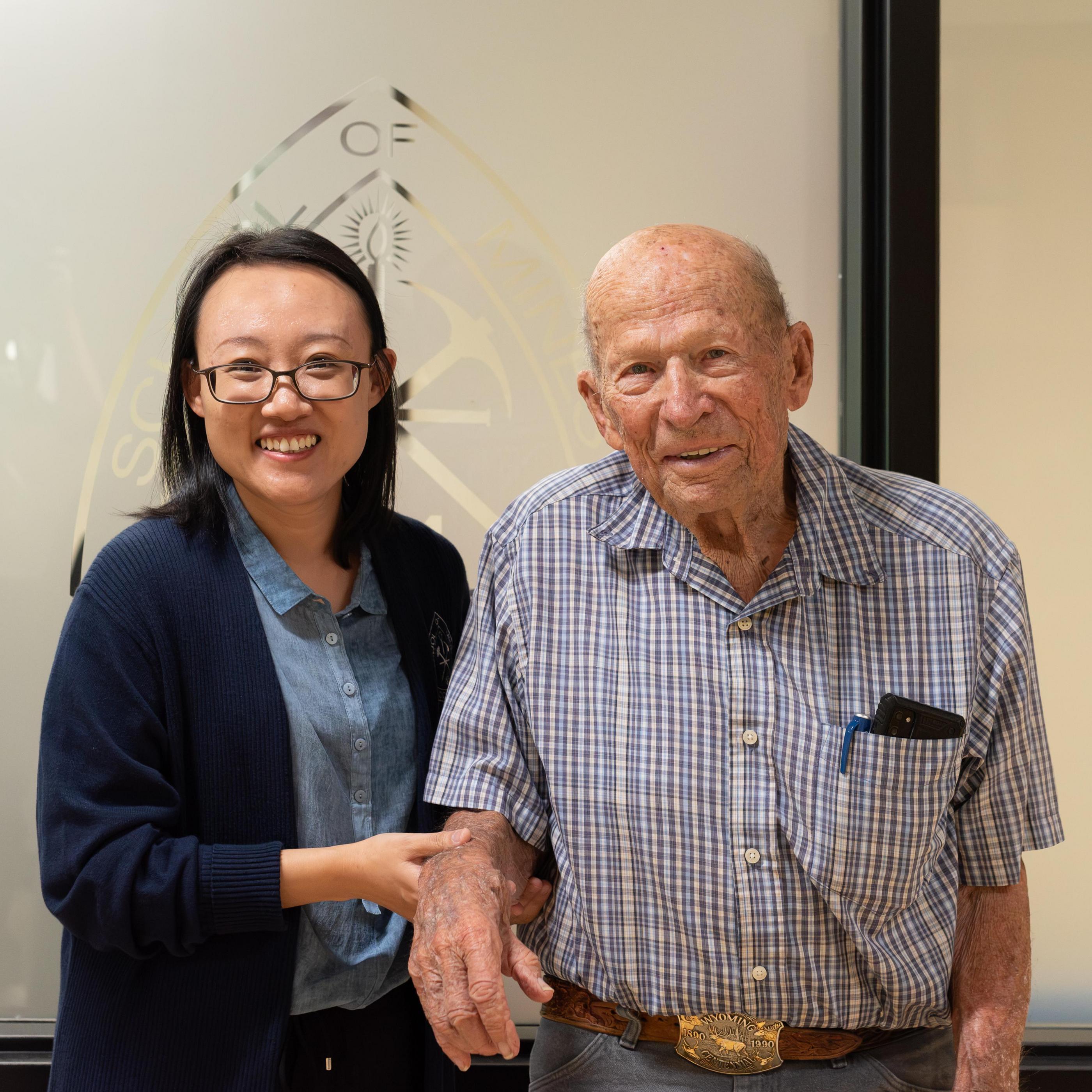 Yilin Fan stands with Don Thorson